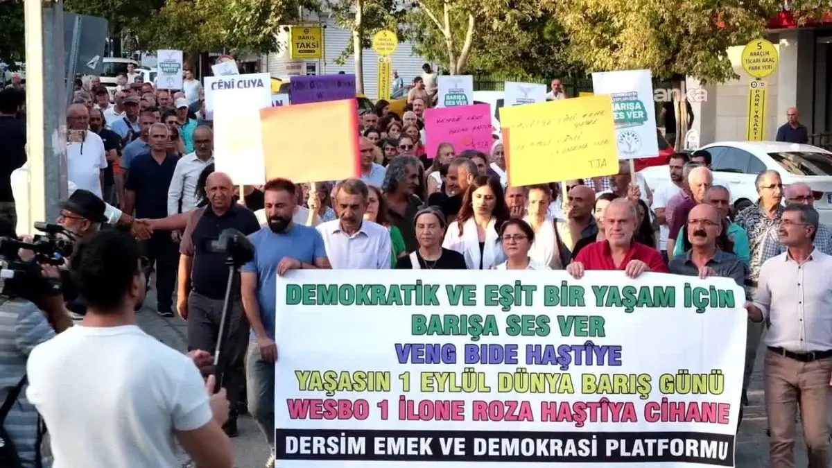 tuncelide dunya baris gunu yuruyusu kvxygwSU